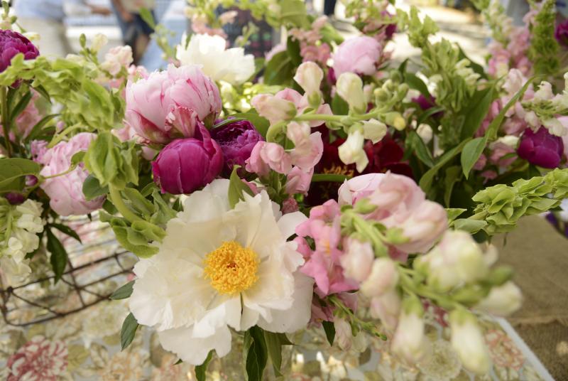 Peonies and snapdragons make an elegant display for Chatham Flower Farm who travels the seaboard education the public about farmers markets.